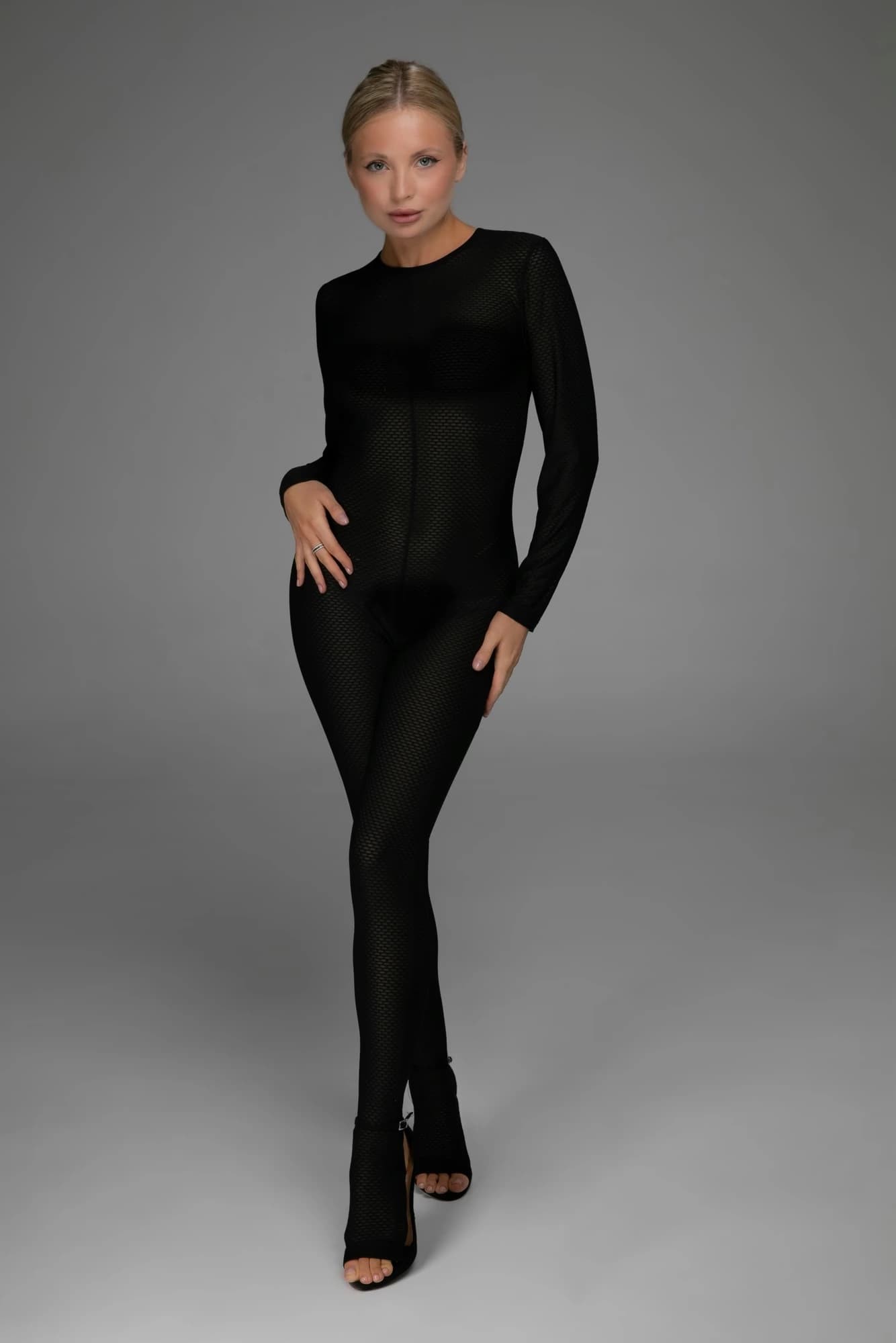 Tuta in rete nera a manica lunga